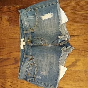 Forever 21  denim distressed shorts with eyelet pockets